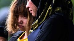 Vietnamese suspect Doan Thi Huong (left) wore body armour as she was escorted out of the Sepang courthouse on March 1, after being charged with the murder of Kim Jong-Nam