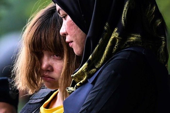 Vietnamese suspect Doan Thi Huong (left) wore body armour as she was escorted out of the Sepang courthouse on March 1, after being charged with the murder of Kim Jong-Nam