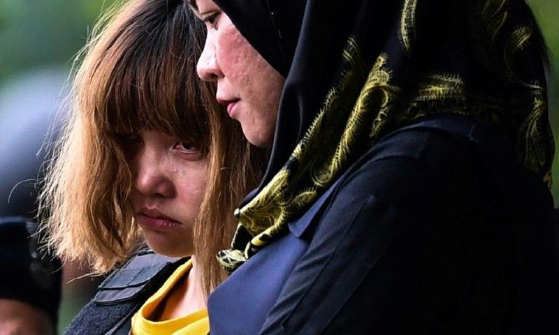 Vietnamese suspect Doan Thi Huong (left) wore body armour as she was escorted out of the Sepang courthouse on March 1, after being charged with the murder of Kim Jong-Nam