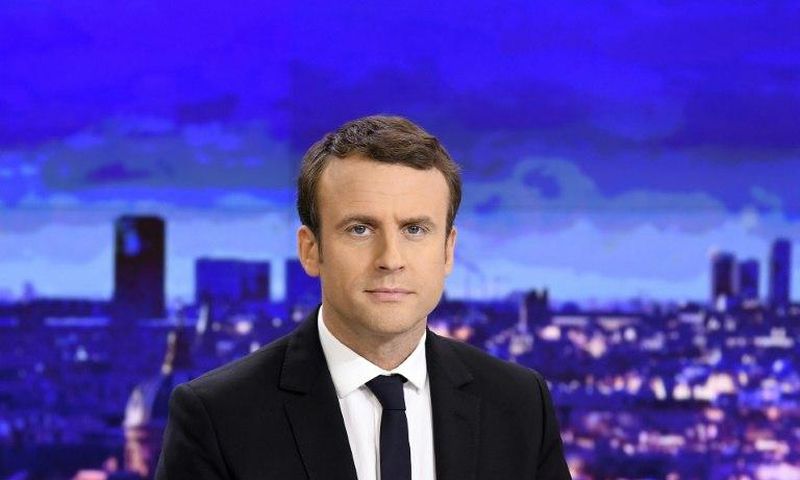 French presidential election candidate for the En Marche ! movement Emmanuel Macron waits before an interview on the set of the French channel France 2 news evening broadcast on April 25, 2017 in Paris