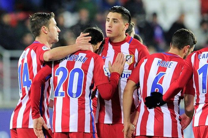 Atletico Madrid's players celebrate after defender Juanfran scored their team's second goal during the Spanish Copa del Rey quarter final second leg football match against SD Eibar January 25, 2017