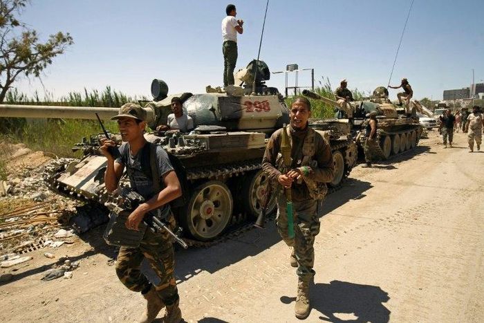 Forces loyal to Libyan strongman Khalifa Haftar, pictured earlier in May 2017, carried out a "joint operation" with Egypt on jihadist camps in Libya's eastern city of Derna