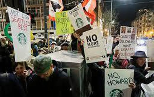 Schultz draws protesters in his hometown, Seattle
