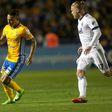 Eduardo Vargas (L) of Mexico's Tigres fights for the ball with Marcel De Jong of Canada's Vancouver Whitecaps during their CONCACAF Champions League semi-final 1st leg match, at the Universitario stadium in Monterrey, on March 14, 2017