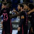 Barcelona's Luis Suarez (2ndR) celebrates with teammates after scoring his team's third goal during their Spanish league football match against Espanyol on April 29, 2017