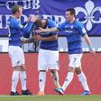 Darmstadt's defender Junior Diaz (C) celebrates scoring during the German first division Bundesliga football match against Borussia Dortmund February 11, 2017