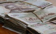 Bundles of Kenyan notes (Twitter)