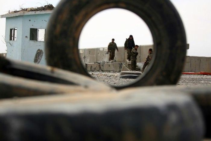 Members of the US-backed Syrian Democratic Forces inspect a dam recently recaptured from jihadists near Raqa on March 27, 2017