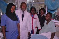 Mother Everlyn Namukhula (right) and medics