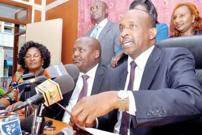 Leader of majority in parliament Aden Duale (right) alongside Tiaty MP Asman Kamama and other Jubilee parliamentarians during a past press conference.