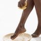 An African woman cleaning her feet