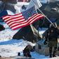US military veterans joined protests against a controversial planned oil pipeline that have led the Army Corps of Engineers to rethink the route