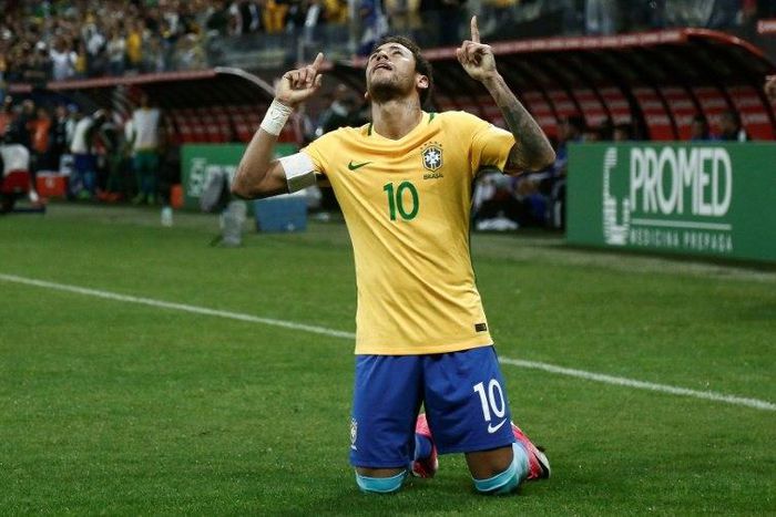 Brazil's Neymar celebrates after scoring against Paraguay during their Russia 2018 World Cup qualifier match, in Sao Paulo, on March 28, 2017