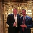 UKIP leader Nigel Farage stands with US President-elect Donald Trump during their meeting at Trump Tower in New York