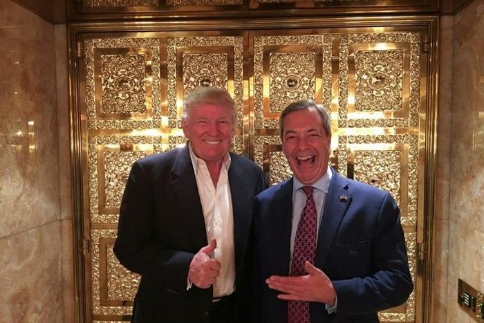 UKIP leader Nigel Farage stands with US President-elect Donald Trump during their meeting at Trump Tower in New York