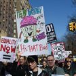 Protestors march down Central Park West in New York City during a "Not My President Day" rally on February 20, 2017