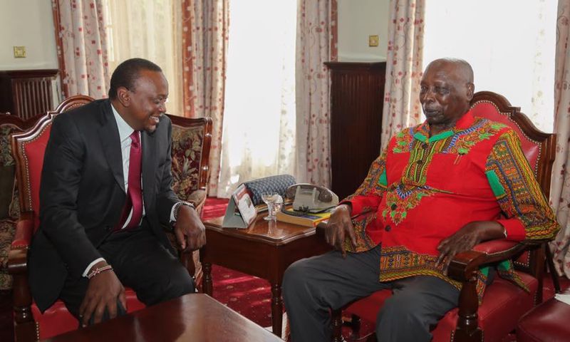 President Uhuru Kenyatta chats with former President Daniel arap Moi when he paid him a courtesy call at his home in Kabarnet Gardens in Nairobi on February 16, 2017.
