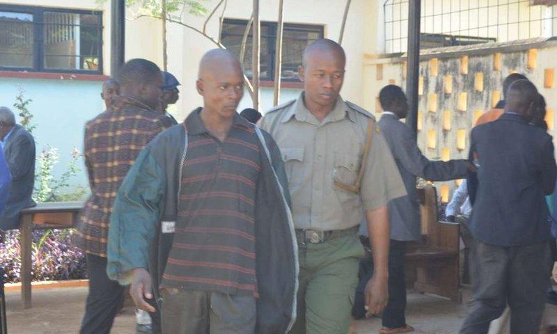 Kevin Simiyu is led outside Bungoma law court he was jailed for fifteen months on Thursday, March, 2017 after pleading guilty to performing sexual acts with a hen.