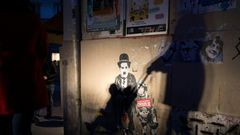 Street art by an unknown artist commemorates the first anniversary of the attack on satirical magazine Charlie Hebdo's Paris office