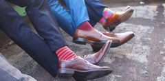 Wear socks that closely match your pants instead of happy socks (Courtesy)