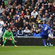Leicester City's Jamie Vardy (R) scores opening goal during their English Premier League football match against West Bromwich Albion at The Hawthorns stadium in West Bromwich, central England, on April 29, 2017