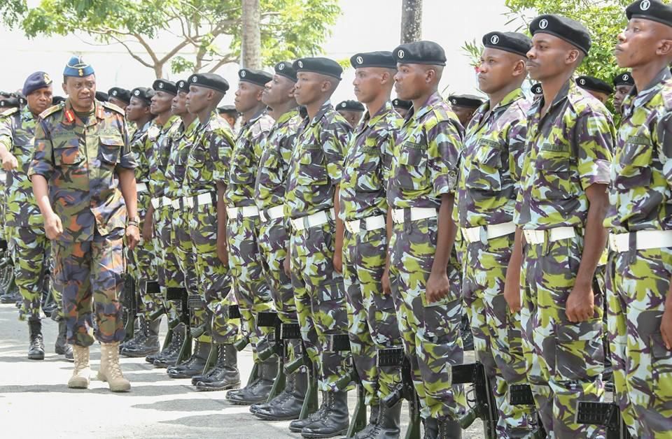 President Uhuru Kenyatta during a past inspection of a guard of honour mounted by Kenya Navy soldiers in their combat fatigues (Twitter)