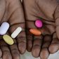 Person holding medicine(afro.who)