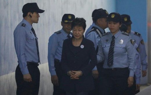 Handcuffed and on her way to court, the fall from grace for ousted South Korean president Park Geun-hye has been steep
