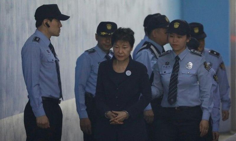 Handcuffed and on her way to court, the fall from grace for ousted South Korean president Park Geun-hye has been steep