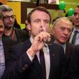 French presidential election frontrunner Emmanuel Macron (C) said he would forbid parliamentarians from employing family members, "to put an end to nepotism"