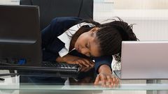 Tired woman at work(Medium)