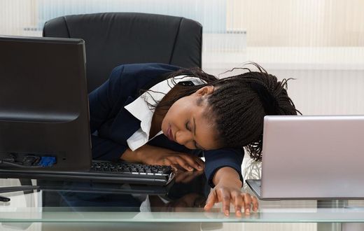 Tired woman at work(Medium)