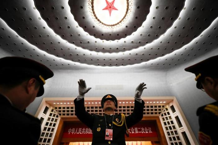 The National People's Congress meets annually in Beijing with many decisions made in advance -- but China's propaganda apparatus has wasted no time in hailing its "system of democracy"