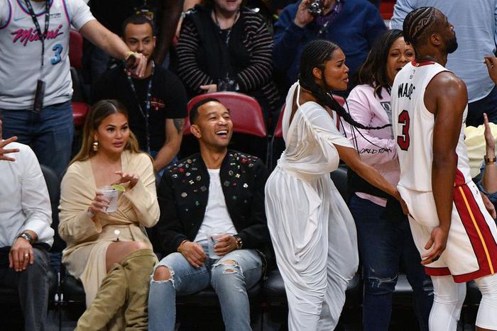 Wade Collides With Legend, Teigen In Iconic Photo