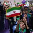 Supporters of incumHassan Rouhani chant slogans during a campaign rally in the northwestern city of Zanjan on May 16, 2017, ahead of the Iranian presidential election on Friday