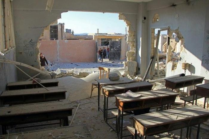 A damaged classroom at a school after it was hit in an air strike in the village of Hass, in the south of Syria's rebel-held Idlib province on October 26, 2016