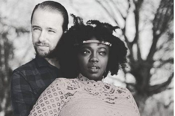 Wendiy Kimani and Marvin cradling her baby bump