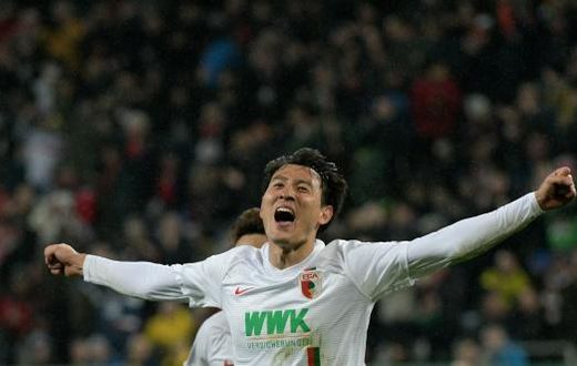 South Korean forward Ji Dong-won showed superb finishing with two goals to stun Bundesliga leaders Borussia Dortmund on Friday as struggling Augsburg sealed a shock 2-1 victory to ease their relegation woes