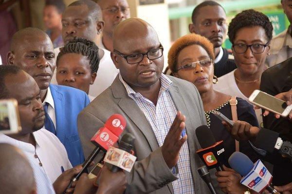 Kenya National Union of Nurses Secretary General Seth Panyako addressing the media