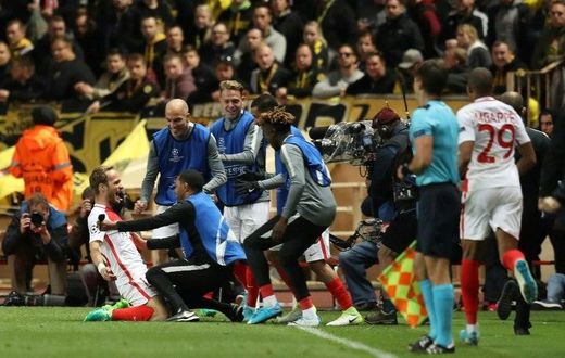 Monaco's Valere Germain celebrates after scoring his team's third goal during the UEFA Champions League match against Borussia Dortmund on April 19, 2017