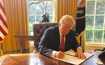 Trump signing the second version of his travel ban on March 6, 2017.