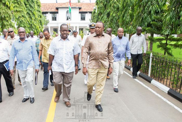 President Uhuru Kenyatta with CS Fred Matiang'i