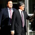 After pleading guilty to fraud and conspiracy charges, former president of the Costa Rican Football Federation Eduardo Li (C) leaves the Court of the Eastern District of New York on October 7, 2016