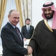 Russian President Vladimir Putin (left) shakes hands with Saudi Deputy Crown Prince Mohammed bin Salman during a meeting at the Kremlin in Moscow, on May 30, 2017