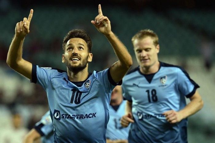 Sydney FC midfielder Milos Ninkovic (C) has been named the A-League's best player