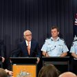 Prime Minister Malcolm Turnbull (2nd L)says the arrest of a man charged with helping the Islamic State group is a reminder that terrorism is an enduring threat