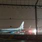 The plane carrying Republican vice presidential nominee Mike Pence slid completely off the runway onto grass next to the tarmac at New York's LaGuardia Airport