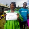 Elgeyo Marakwet woman representative hopeful Florence Boinett displays the certificate the received fromt he IEBC after clearance on May 31, 2017.