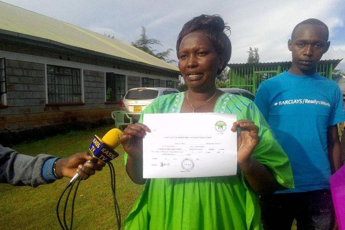 Elgeyo Marakwet woman representative hopeful Florence Boinett displays the certificate the received fromt he IEBC after clearance on May 31, 2017.