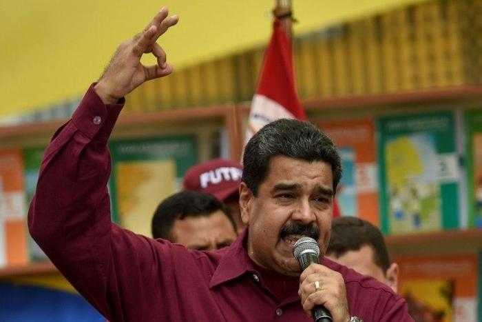 Venezuelan President Nicolas Maduro speaks during a meeting in Caracas on October 28, 2016